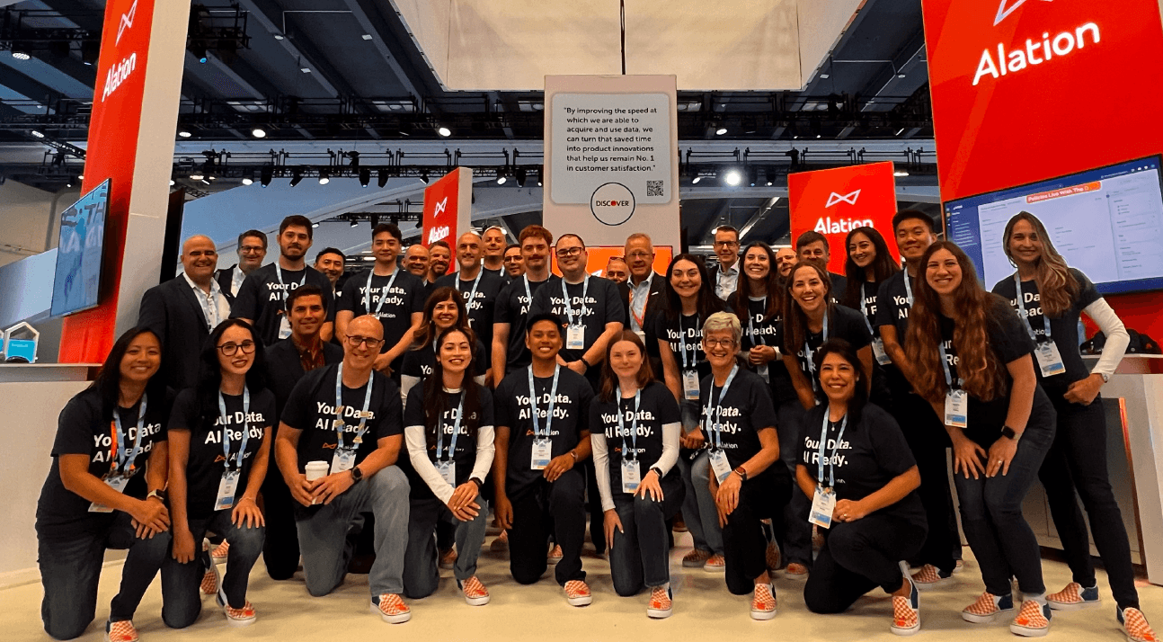 Alation team at the booth at Snowflake Summit 2024