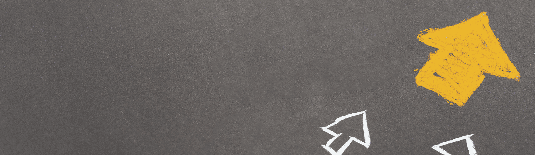 Multiple chalk-drawn arrows on a chalkboard pointing up