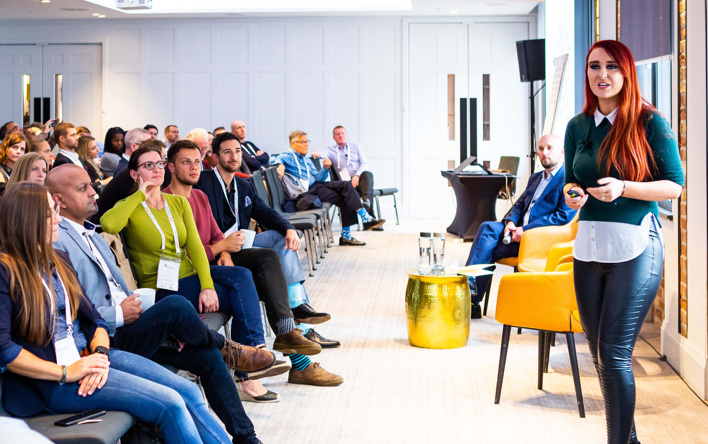 A room of people listening to an Alation customer at our revAlation London conference
