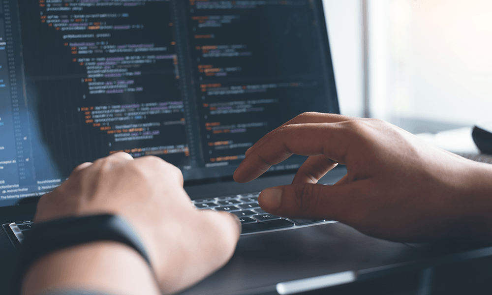 Stock photo of business worker on laptop
