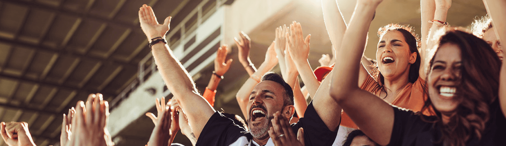 Alation Blog Image: Crowd in sport stadium cheering for the GOAT of Data Catalogs